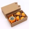 Orange teservis i keramik i presentförpackning