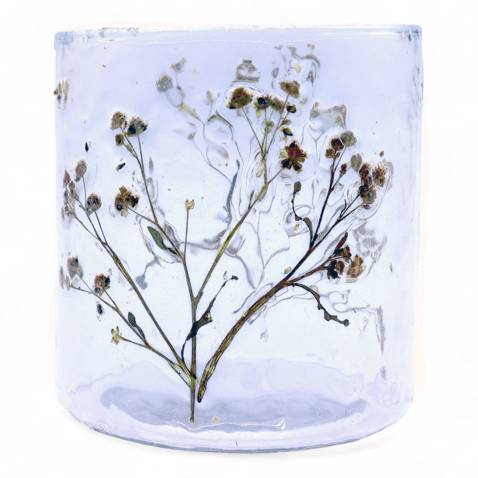 Ljushållare i glas med torkade blommor