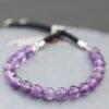 bG9jYWw6Ly9tZWRpYS85US8yRC82MFIzMEMxRzZNV0syRDlRL2E0N2EzOGQyLmpwZWc.jpg Justerbart armband med runda ametistpärlor