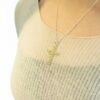 bG9jYWw6Ly9tZWRpYS85Uy82RC82MFIzMEMxSjZDVEs2RDlTLzY4MTIxYWQwLmpwZw-4.jpg Halsband med grön peridot och korsformat hänge