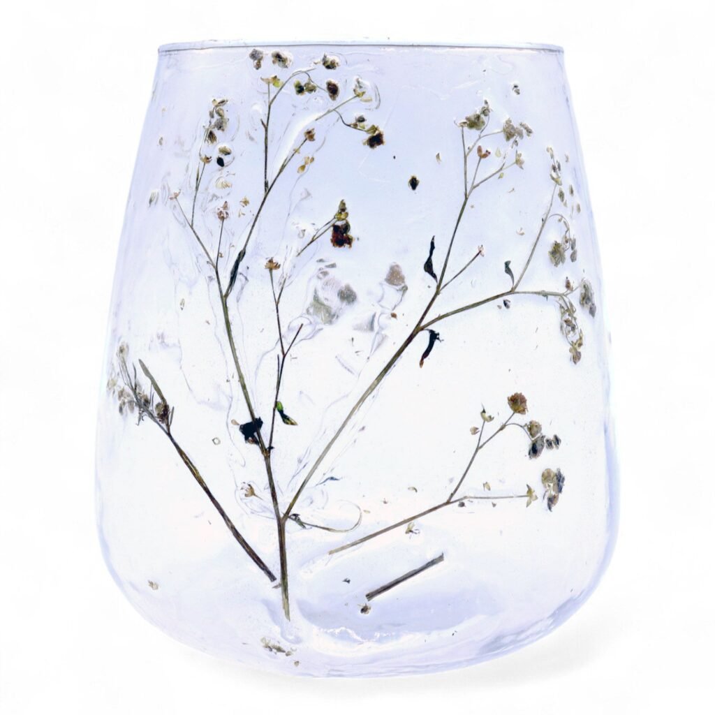 Ljushållare i glas med torkade blommo