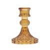 Klassiska ljusstake i bärnstensfärgat glas