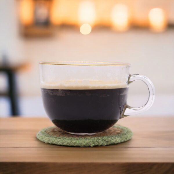 Glasunderlägg i jute och bomull under kaffekopp