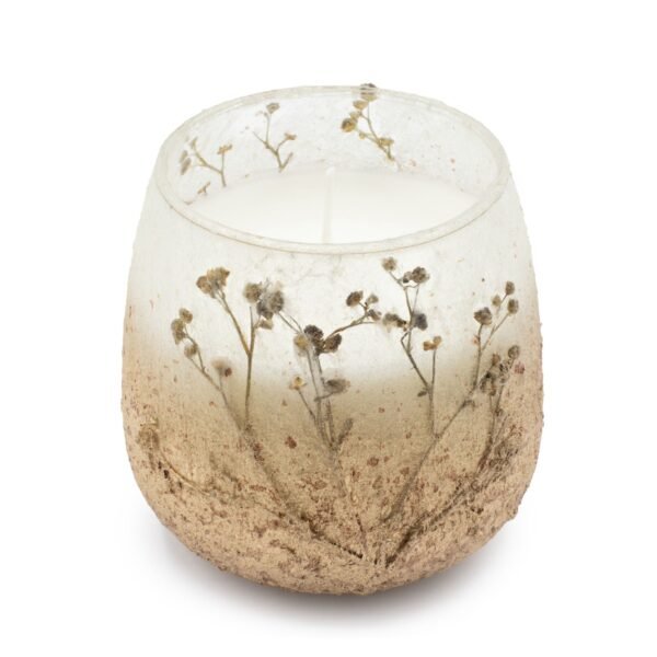 Dekorativt ljus i glas med torkade blommor