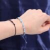 bG9jYWw6Ly9tZWRpYS85Ui8yRC82MFIzMEMxRzZXVEsyRDlSLzc4NDY0ZjA2LmpwZWc.jpg Kristallarmband för Fiskarna på handled
